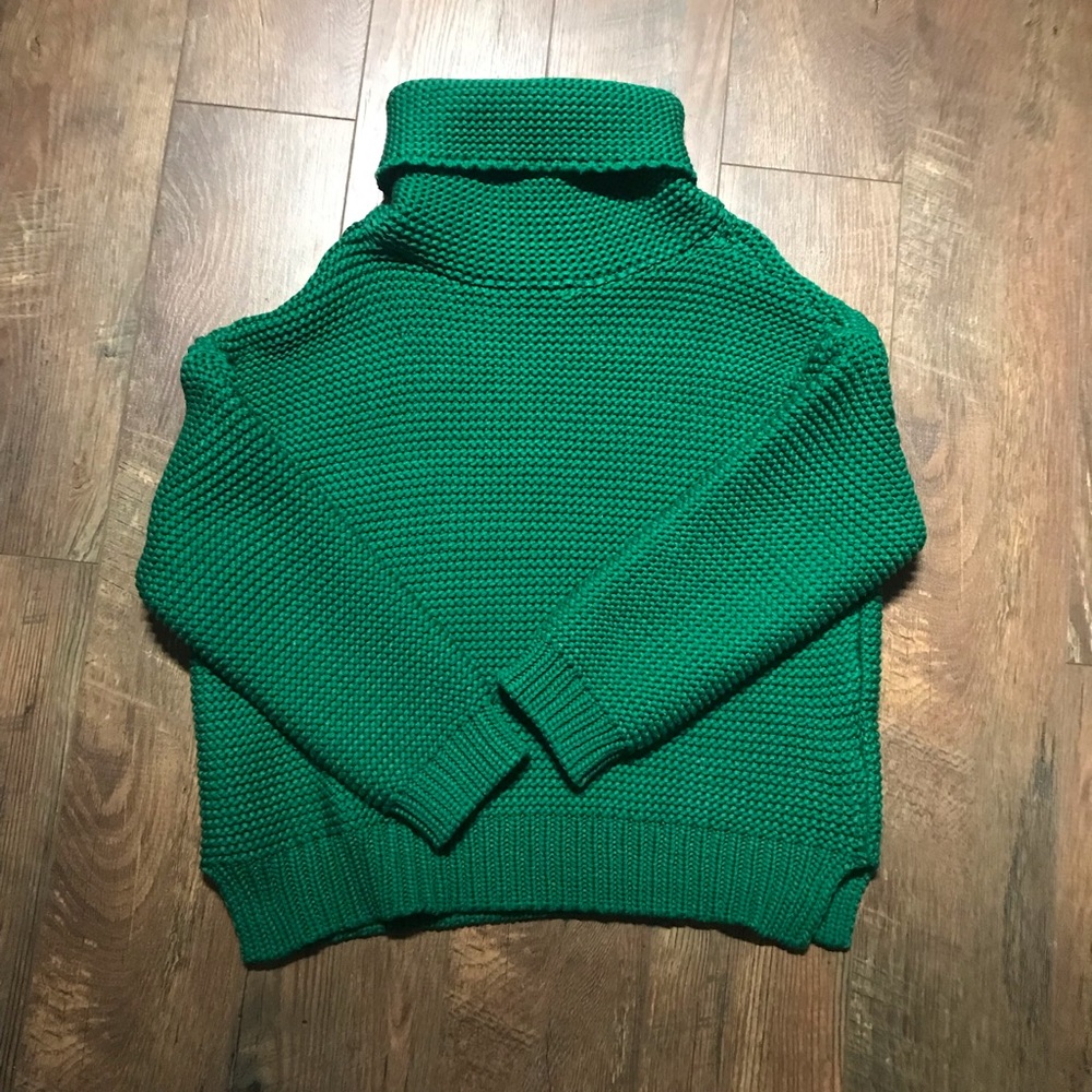 Green turtleneck sweater